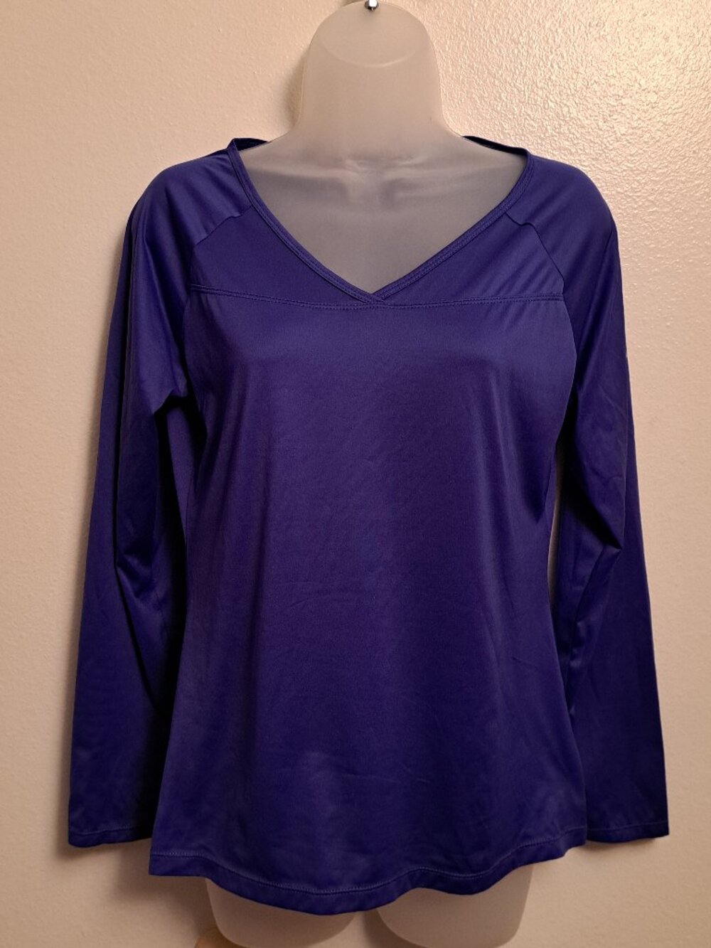 Columbia women's performance long-sleeve v-neck athletic shirt with logo